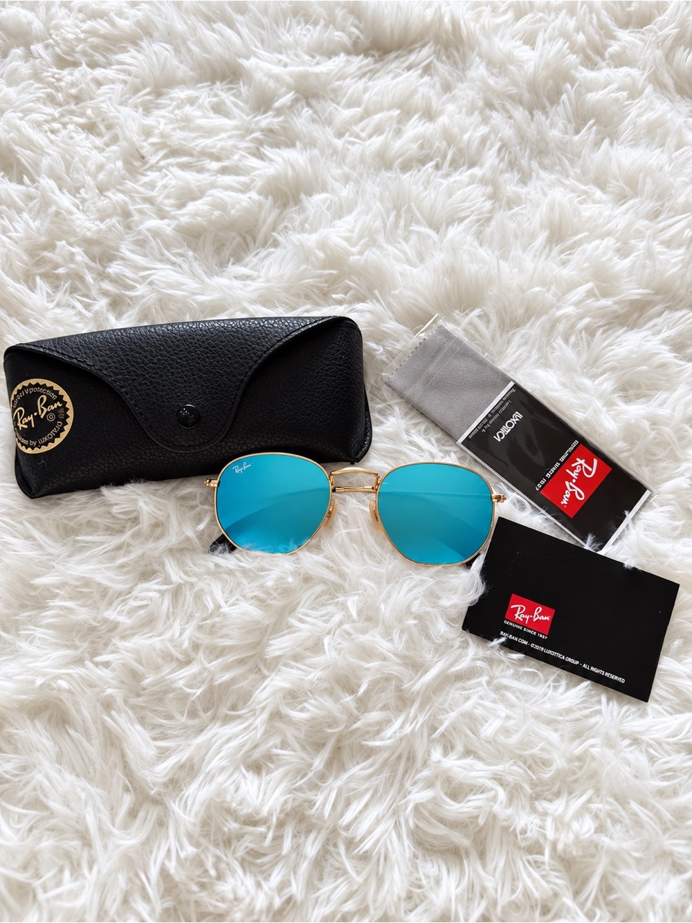 Ray-Ban Women's Gold Frame Sunglasses with Blue Mirrored Lenses